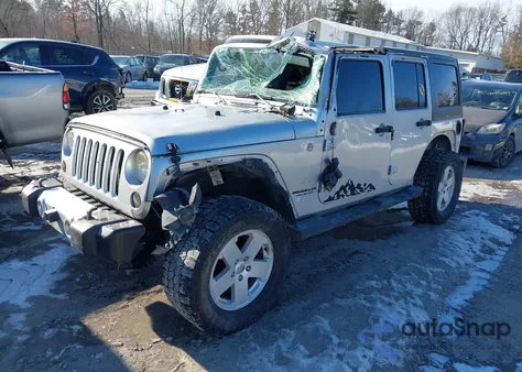 2012 Jeep Wrangler Unlimited Sahara z USA, uszkodzony, nr VIN 1C4BJWEG9CL106741